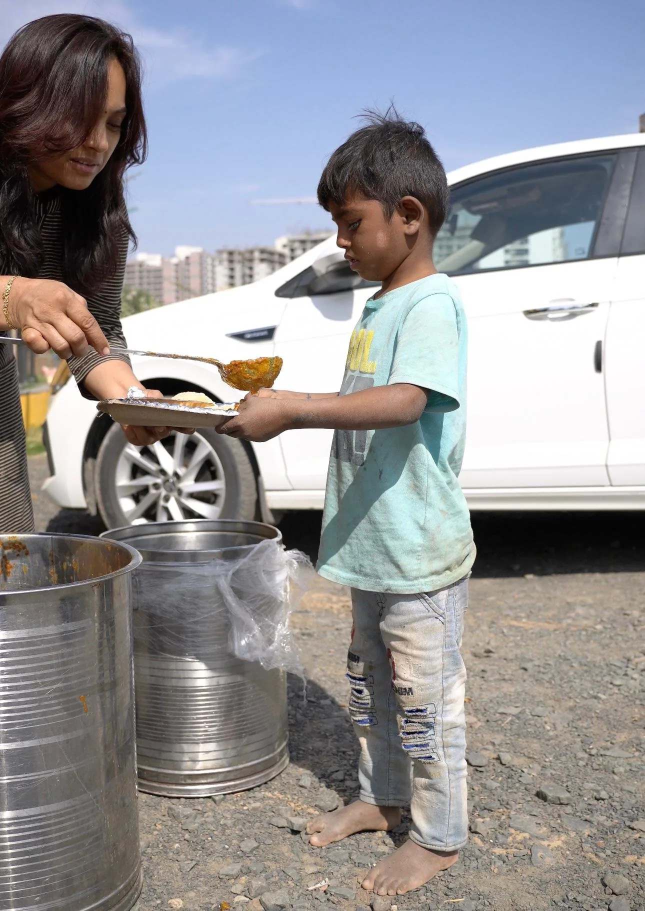 Shree Foundation volunteers handing out support to families