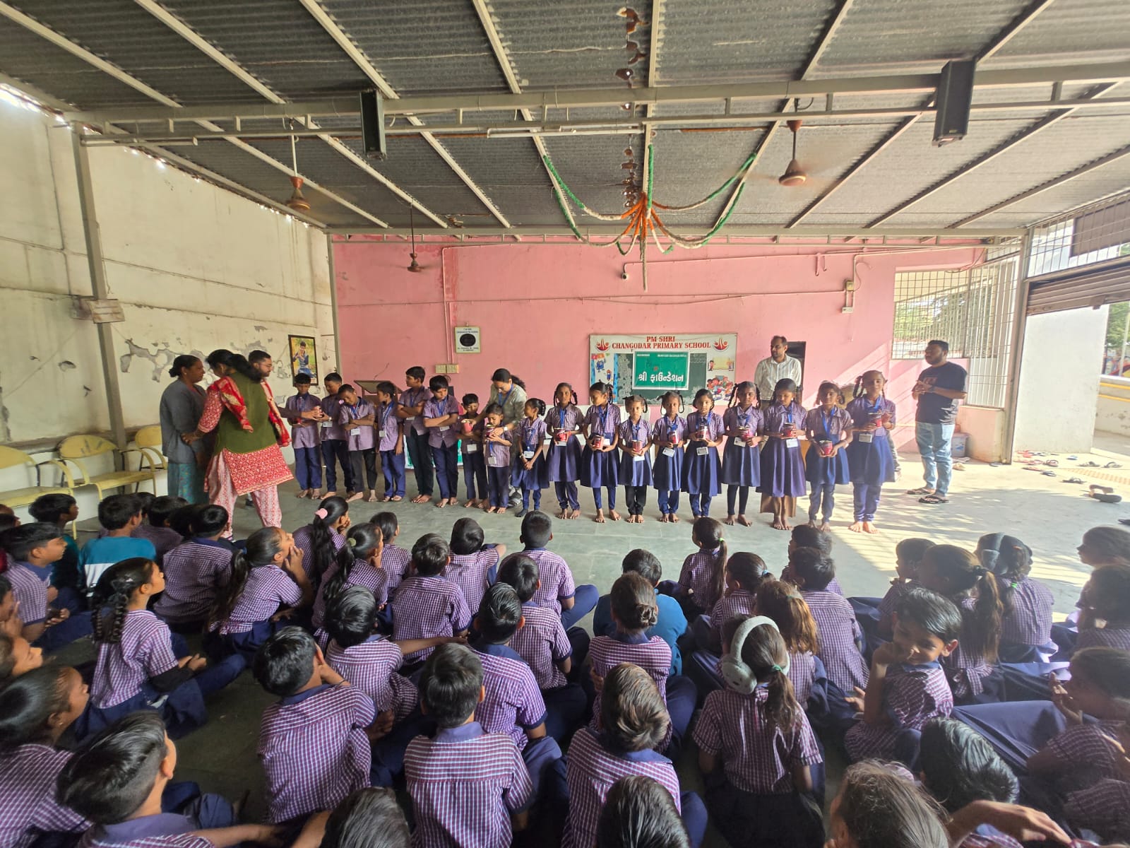 Schoolchildren gathered at a Shree Foundation community outreach event