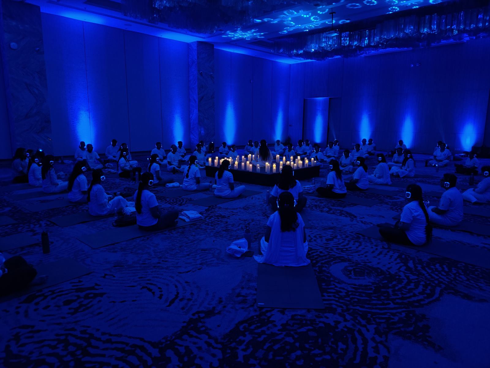 Participants practising yoga during a Shree Foundation Naad Resonance session