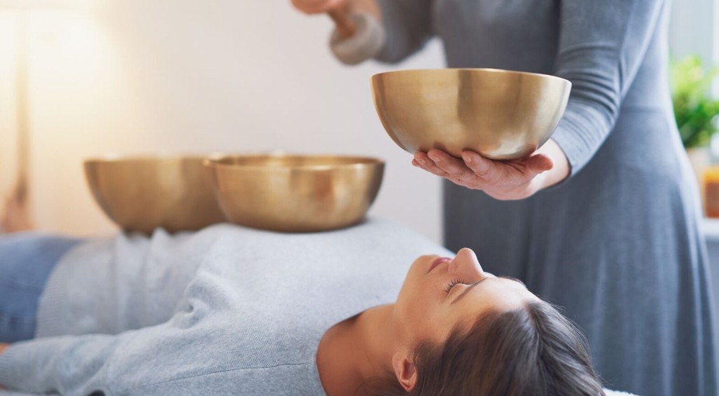 A sound therapy session using singing bowls